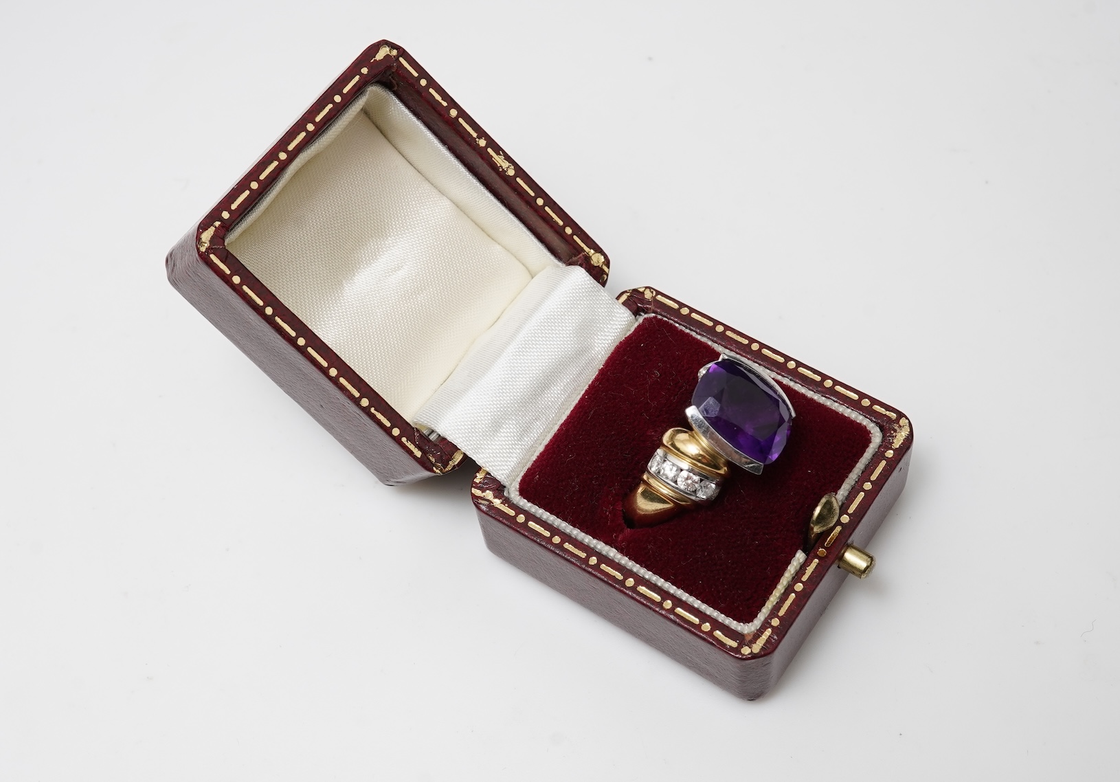 An amethyst and diamond ring